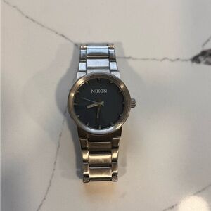 Nixon men’s silver watch